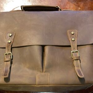 Brown oiled leather briefcase/messenger bag.
